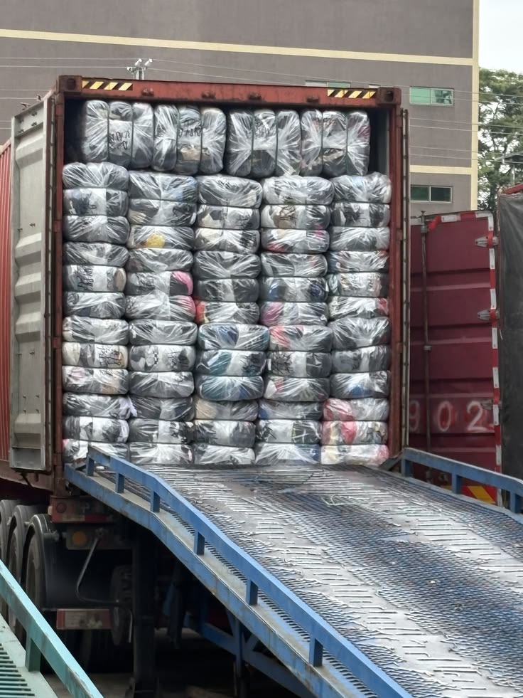 Container loaded with Galaxy Rags bales
